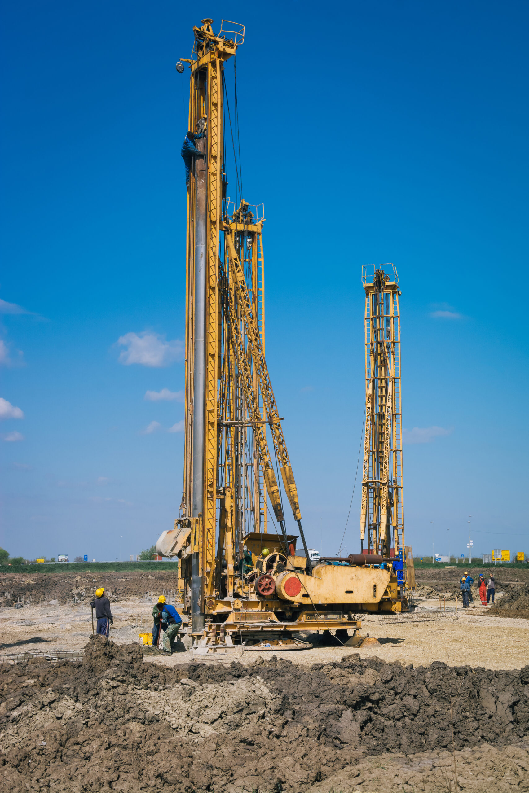 Pile driving machine in construction site